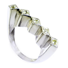 Ayesha silver ring featuring multiple green gemstones in a unique geometric design green gemstone statement ring