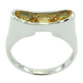 Eliza modern yellow gemstone ring featuring three oval yellow stones set in a sleek silver band
