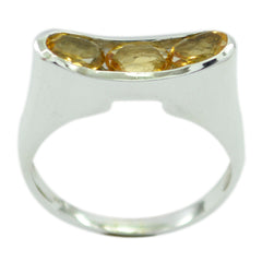 Eliza modern yellow gemstone ring featuring three oval yellow stones set in a sleek silver band