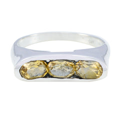 Eliza modern yellow gemstone ring with three oval yellow gemstones set in silver band