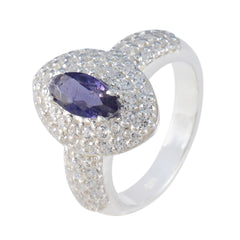 Julieta trendy blue halo ring with a marquise blue gemstone and sparkling clear crystals
