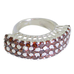 Julia Victorian red gemstone ring with multiple rows of red stones set in silver band