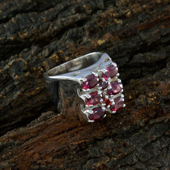 Katharina antique red gemstone ring featuring three rows of oval red stones set in polished silver band