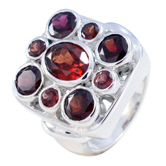 Maya vintage red navratna ring with multiple deep red gemstones set in silver band