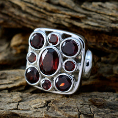 Maya vintage red navratna ring with multiple red gemstones set in a silver square band