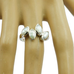 Greta white gemstone statement ring with four marquise-shaped stones on silver band