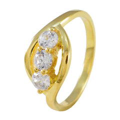 Yasmine gold ring featuring three clear stones in a white trilogy ring for women design