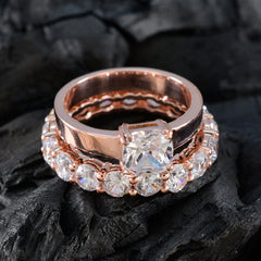 Nari white wedding ring set for women with rose gold bands and sparkling clear gemstones