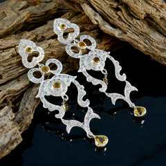 Natcha Yellow Edgy Stud Earrings for Unique Style