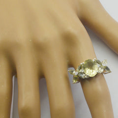 Sara yellow gemstone floral ring with delicate design worn on finger