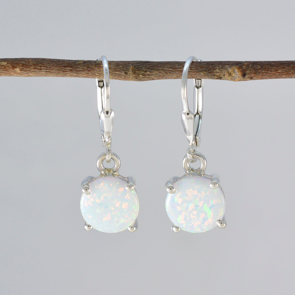 Nari White Delicate Solitaire Dangle Earring