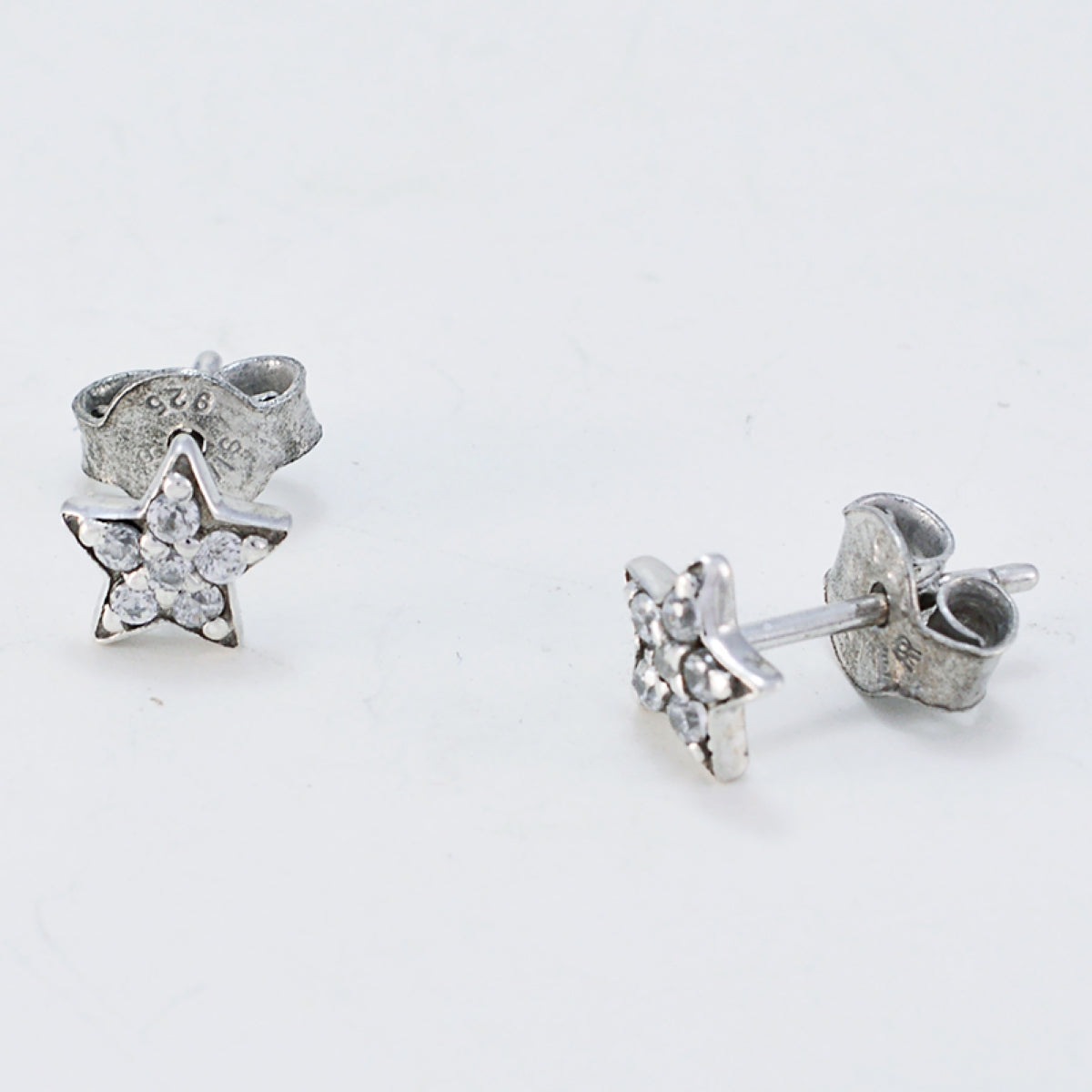 Hazel White Edgy multiple Stud Earring