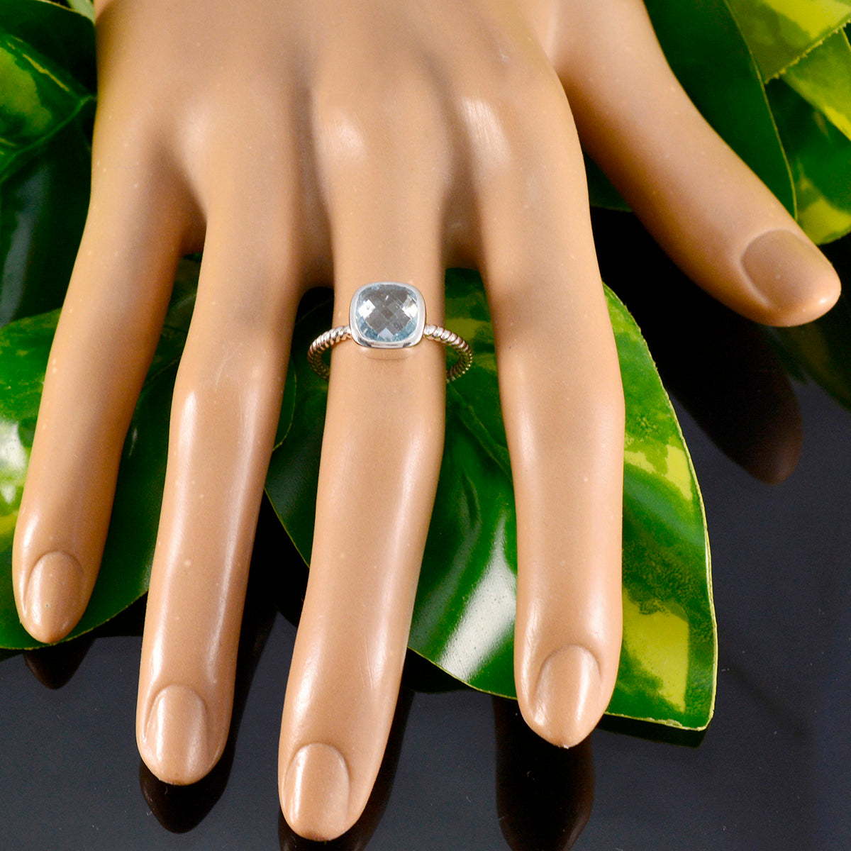 Araya Twist Blue Solitaire Ring