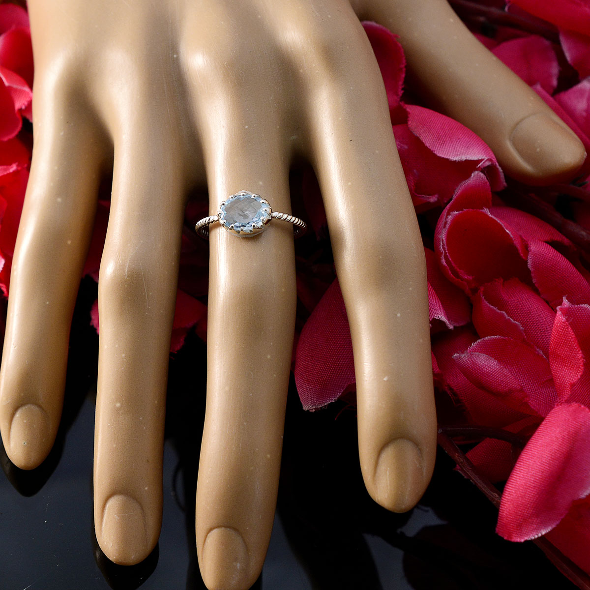 Grace Twist Blue Solitaire Ring