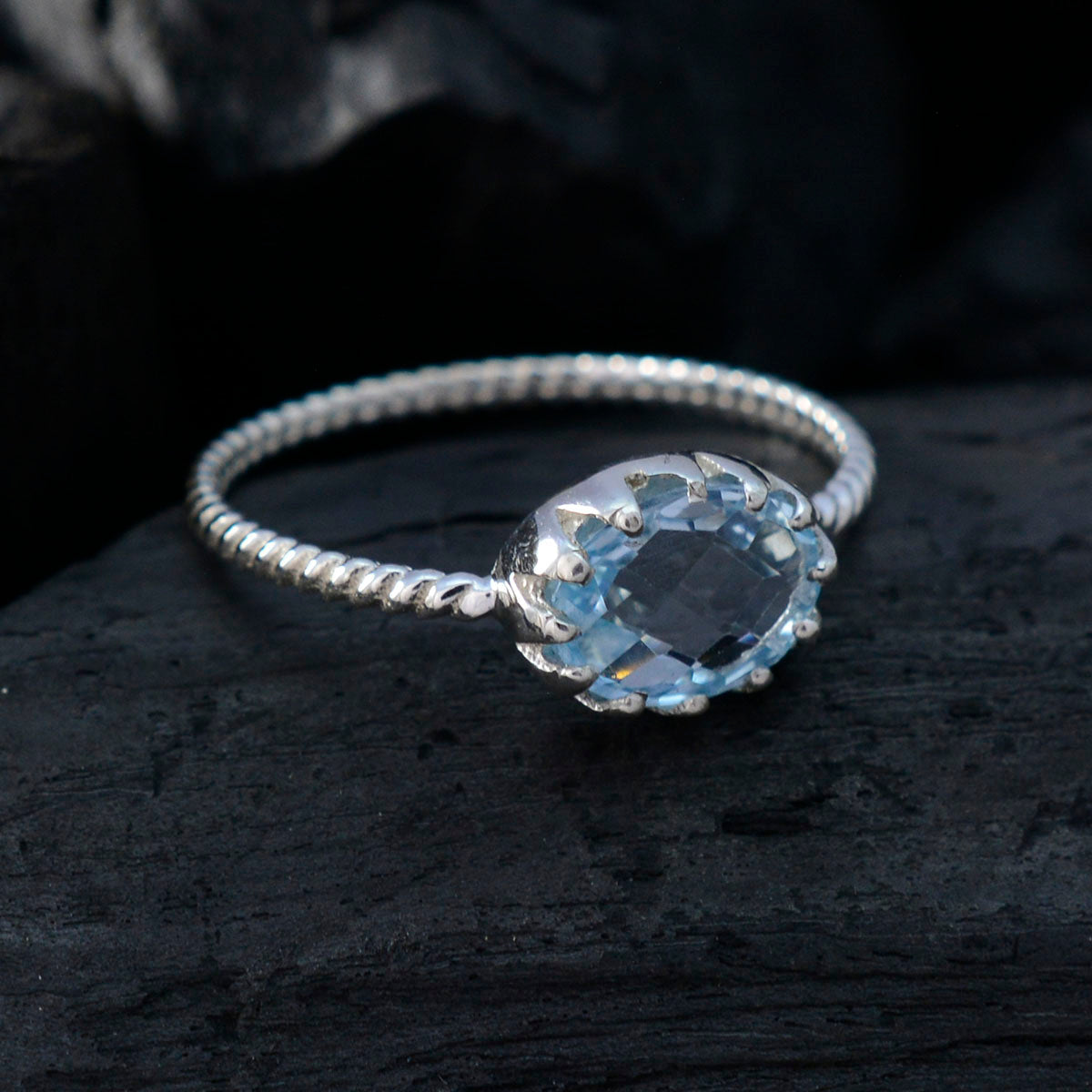 Grace Twist Blue Solitaire Ring