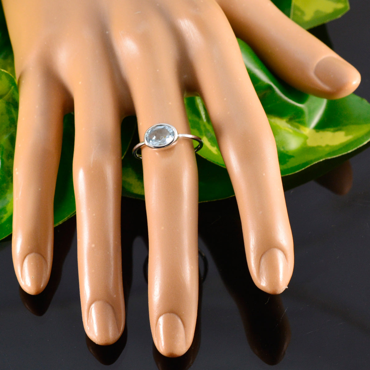 Hannah Graceful Blue Solitaire Ring