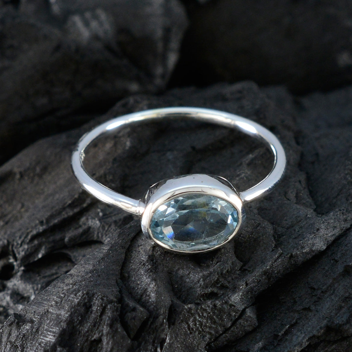 Hannah Graceful Blue Solitaire Ring