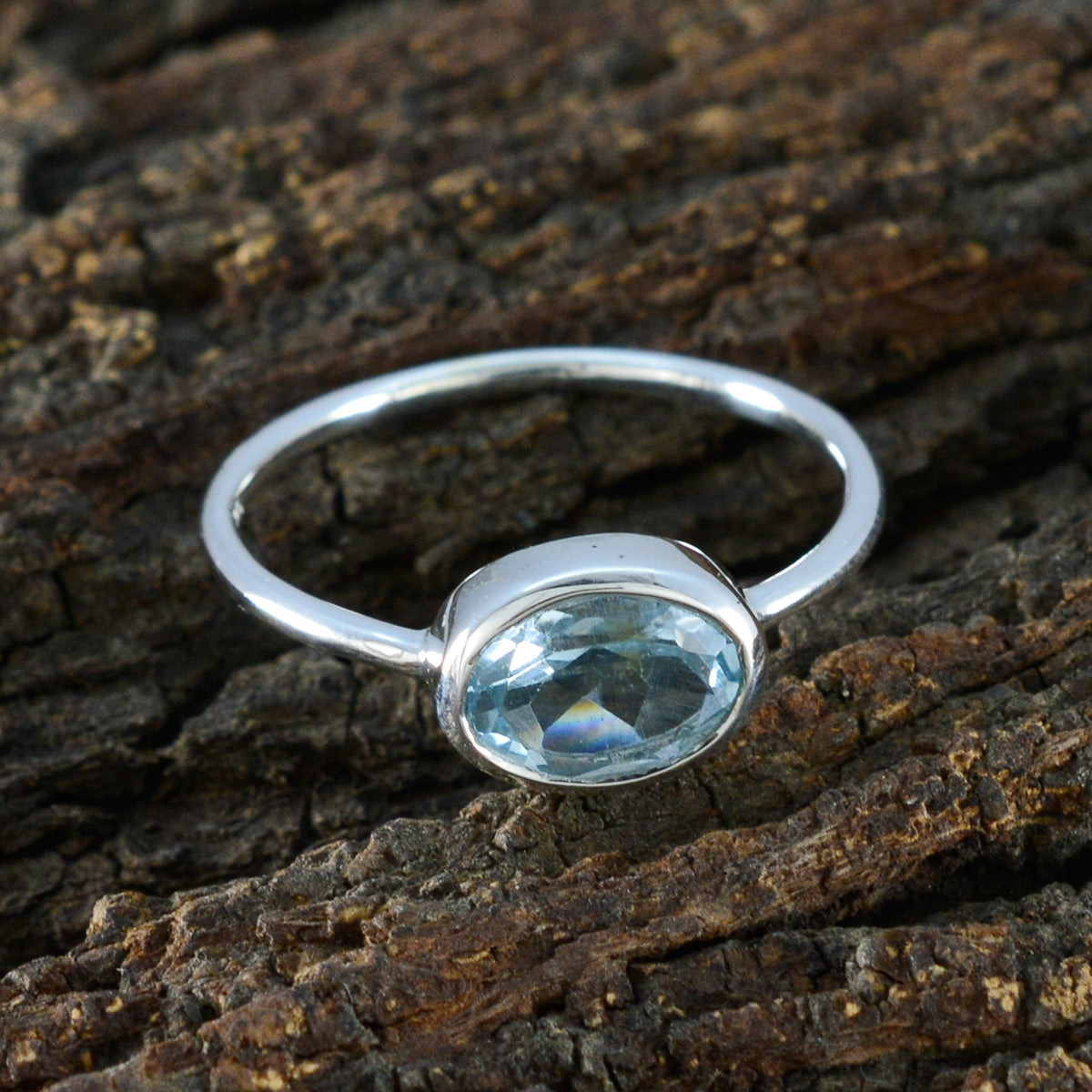 Hannah Graceful Blue Solitaire Ring