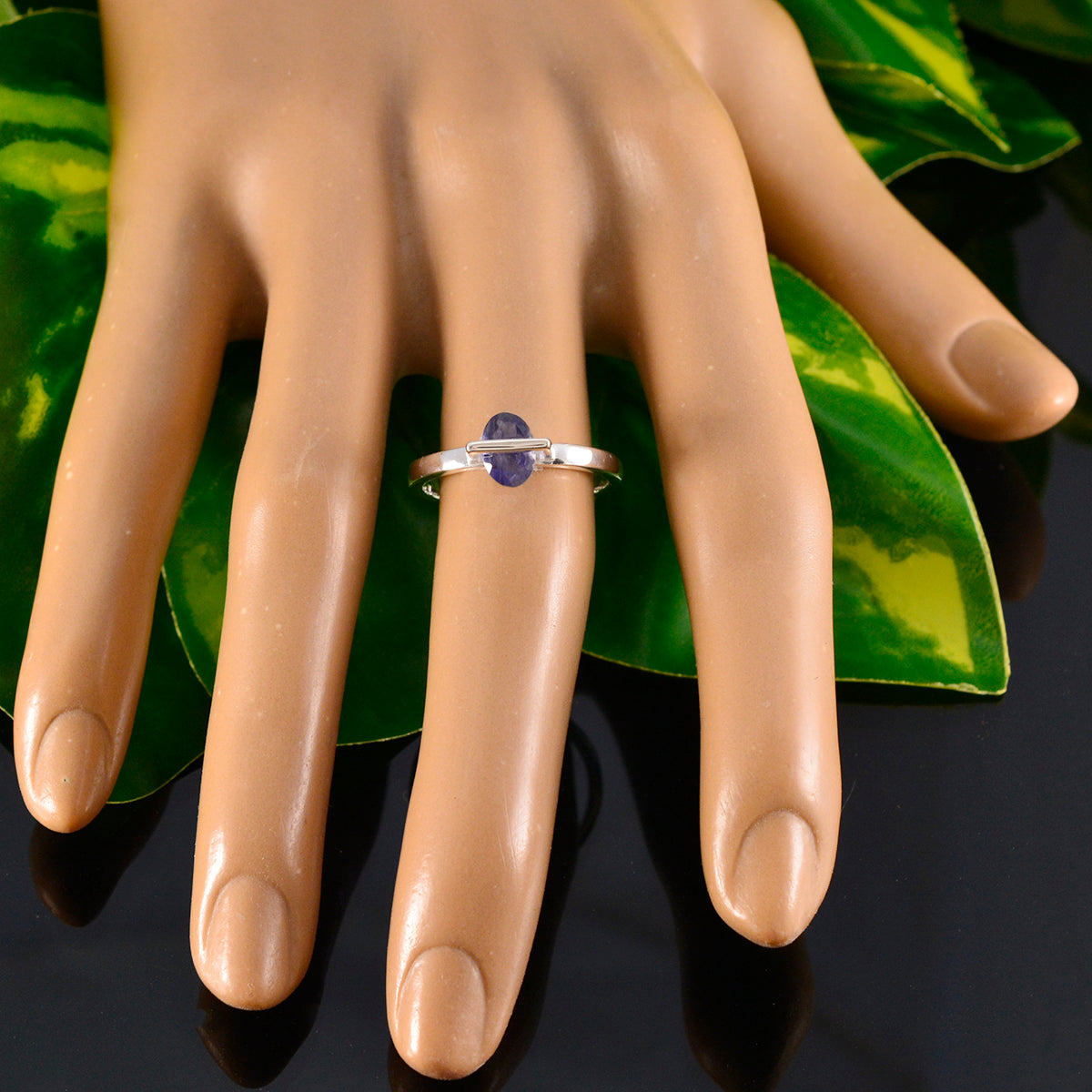Clara Feminine Blue Solitaire Ring