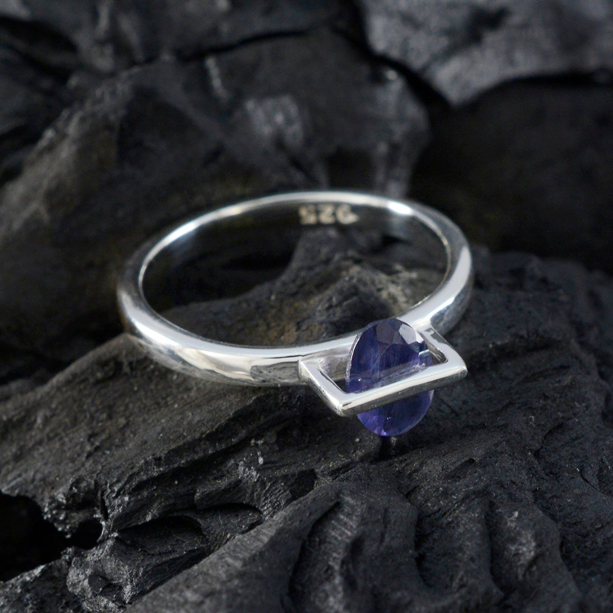 Clara Feminine Blue Solitaire Ring