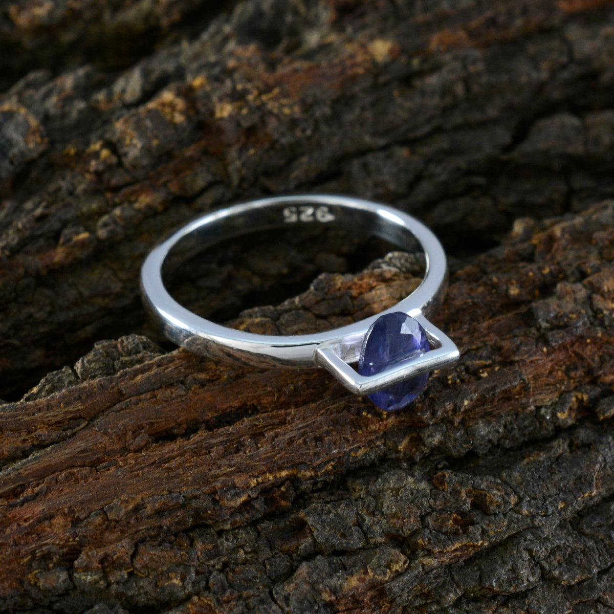 Clara Feminine Blue Solitaire Ring