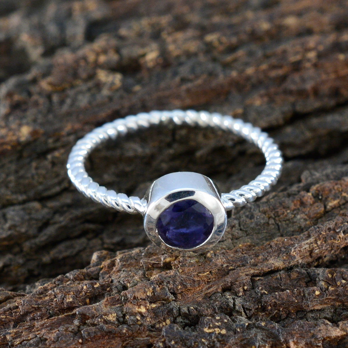 Zoey Graceful Blue Solitaire Ring