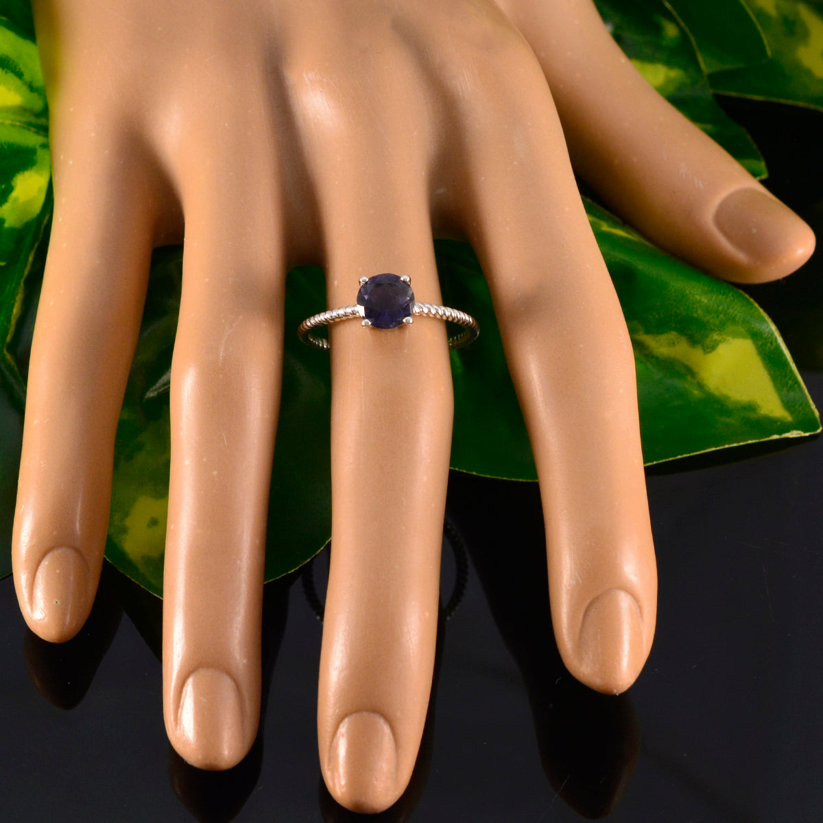 Ling Twist Blue Solitaire Ring
