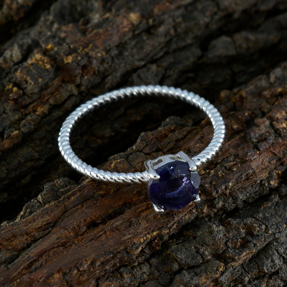 Ling Twist Blue Solitaire Ring