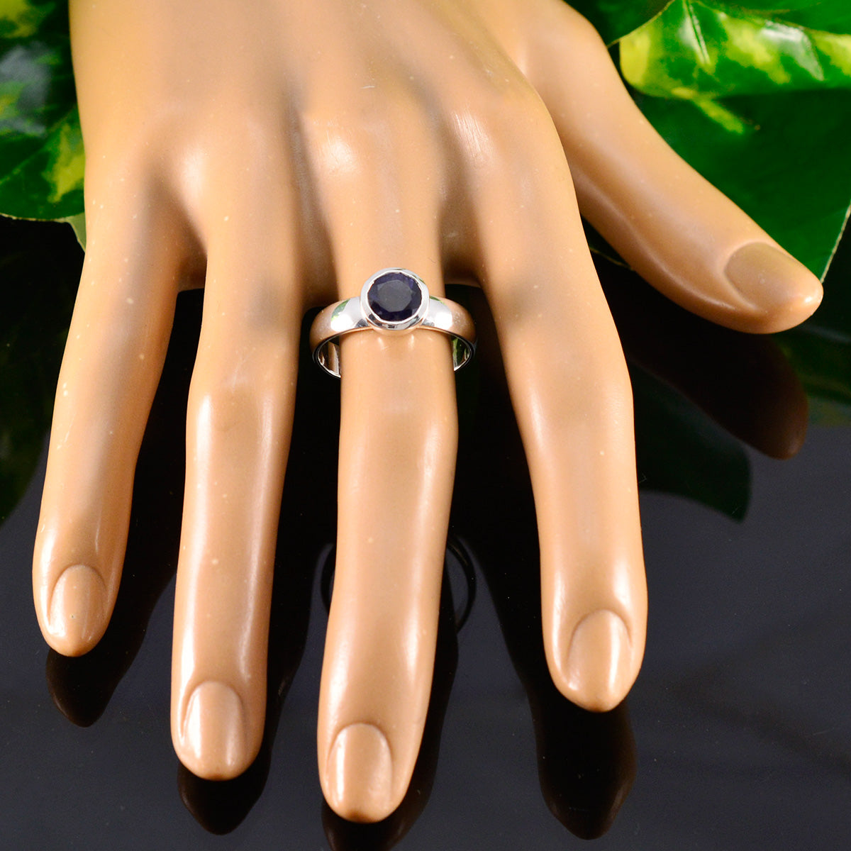 Andrea Feminine Blue Solitaire Ring