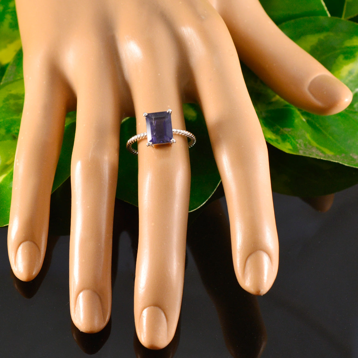 Natcha Twist Blue Solitaire Ring