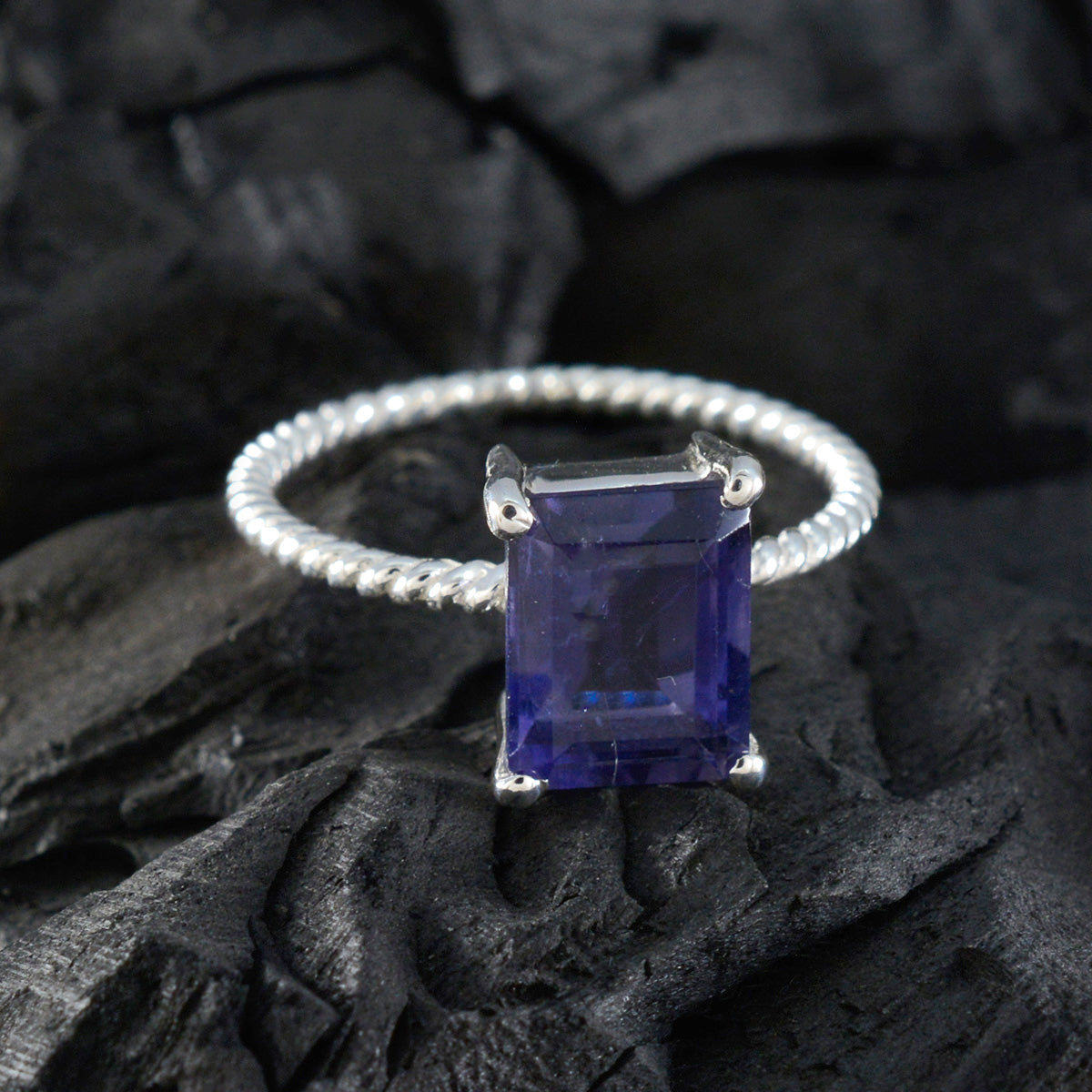 Natcha Twist Blue Solitaire Ring