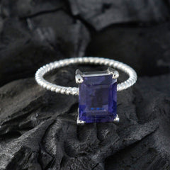 Natcha Twist Blue Solitaire Ring