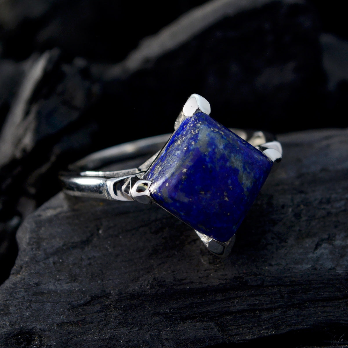 Camilla Sophisticated Blue Solitaire Ring