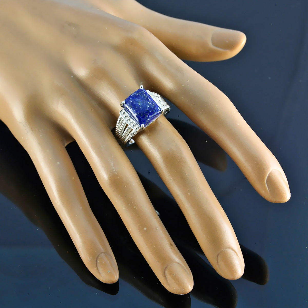 Evelyn Luxurious Blue Solitaire Ring