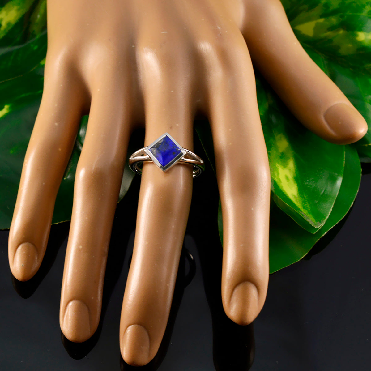 Emi Contemporary Blue Solitaire Ring