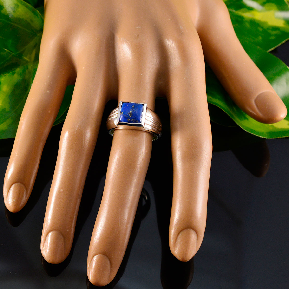 Lorena Graceful Blue Solitaire Ring