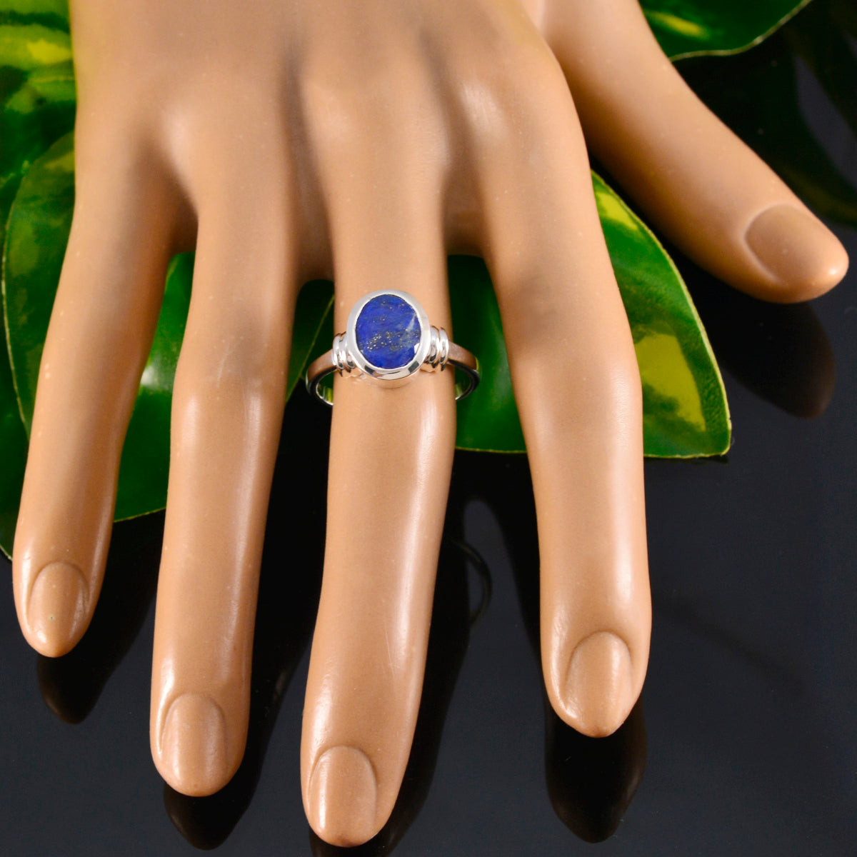 Natalie Luxurious Blue Solitaire Ring