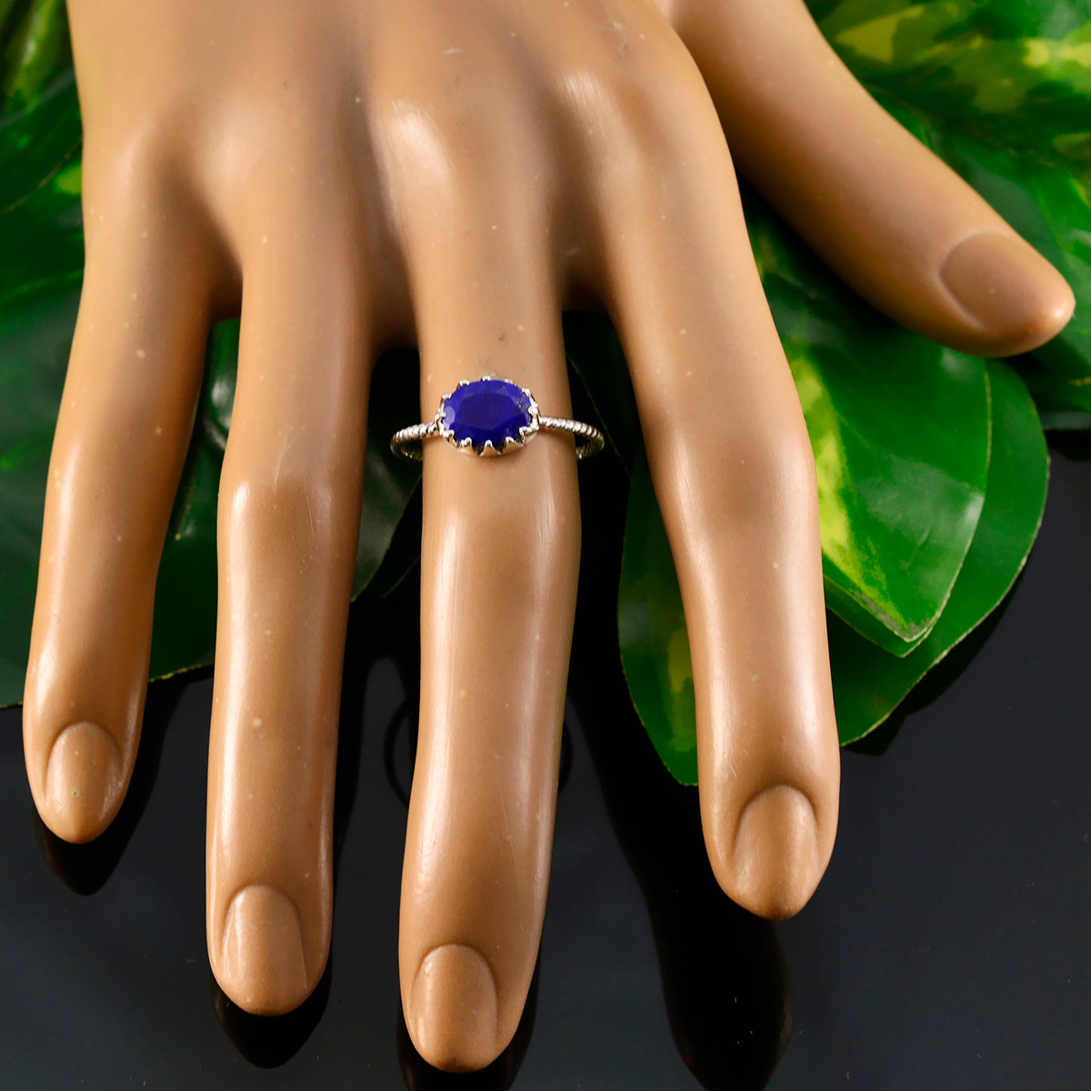Liyana Twist Blue Solitaire Ring