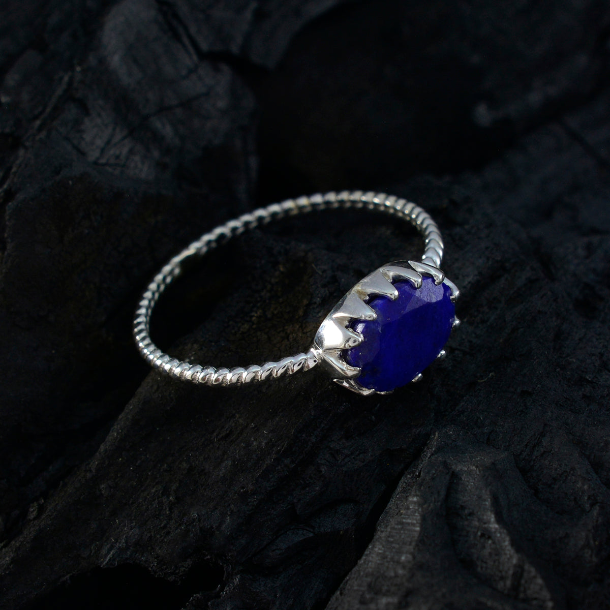 Liyana Twist Blue Solitaire Ring