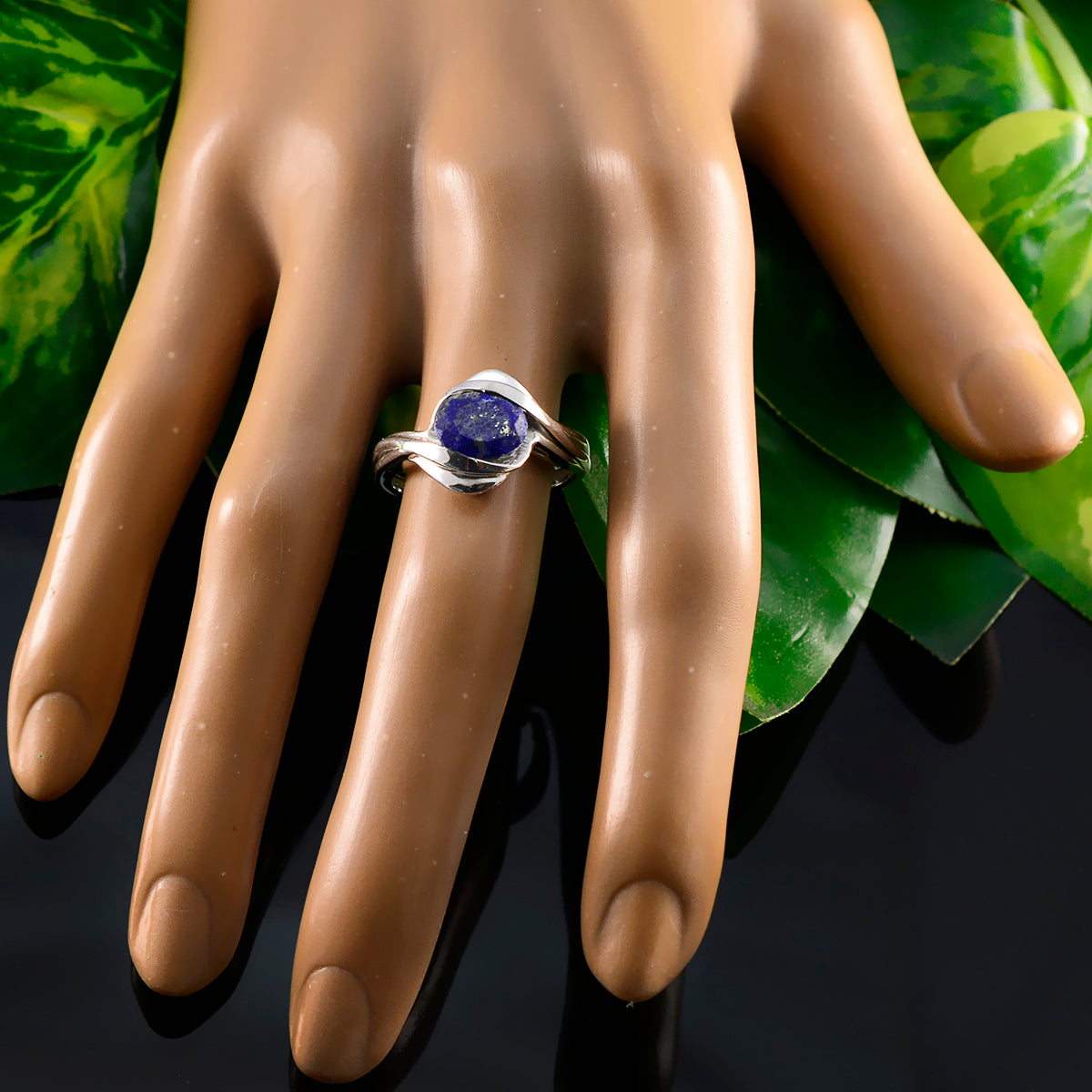 Patricia Contemporary Blue Solitaire Ring