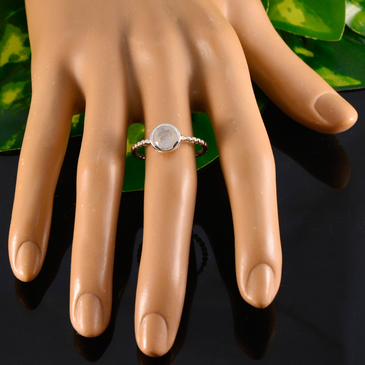 Xiu Twist White Solitaire Ring