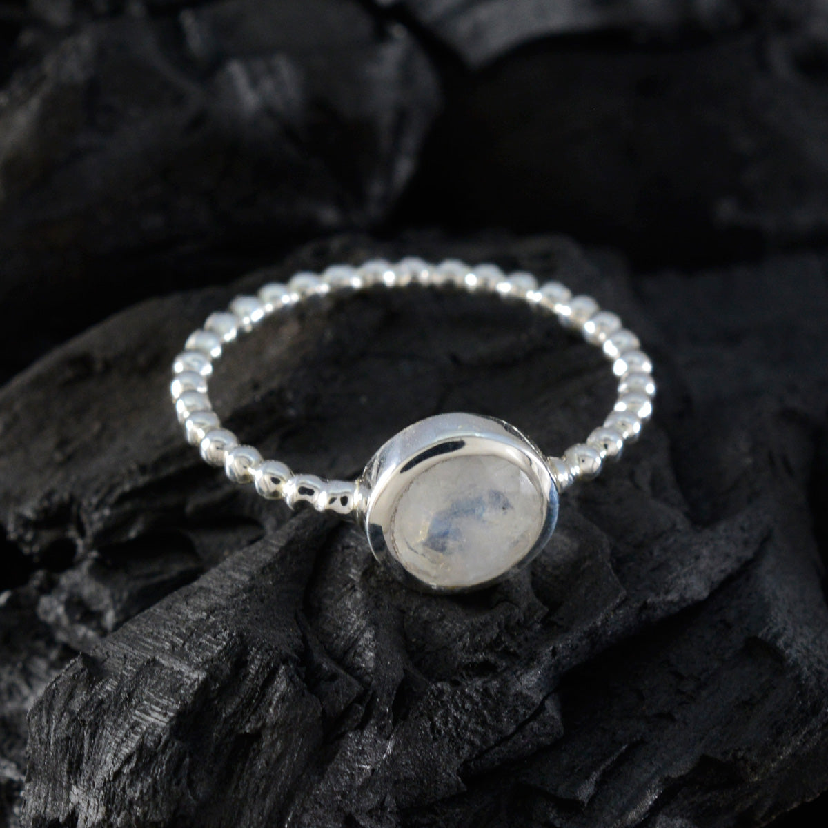Xiu Twist White Solitaire Ring