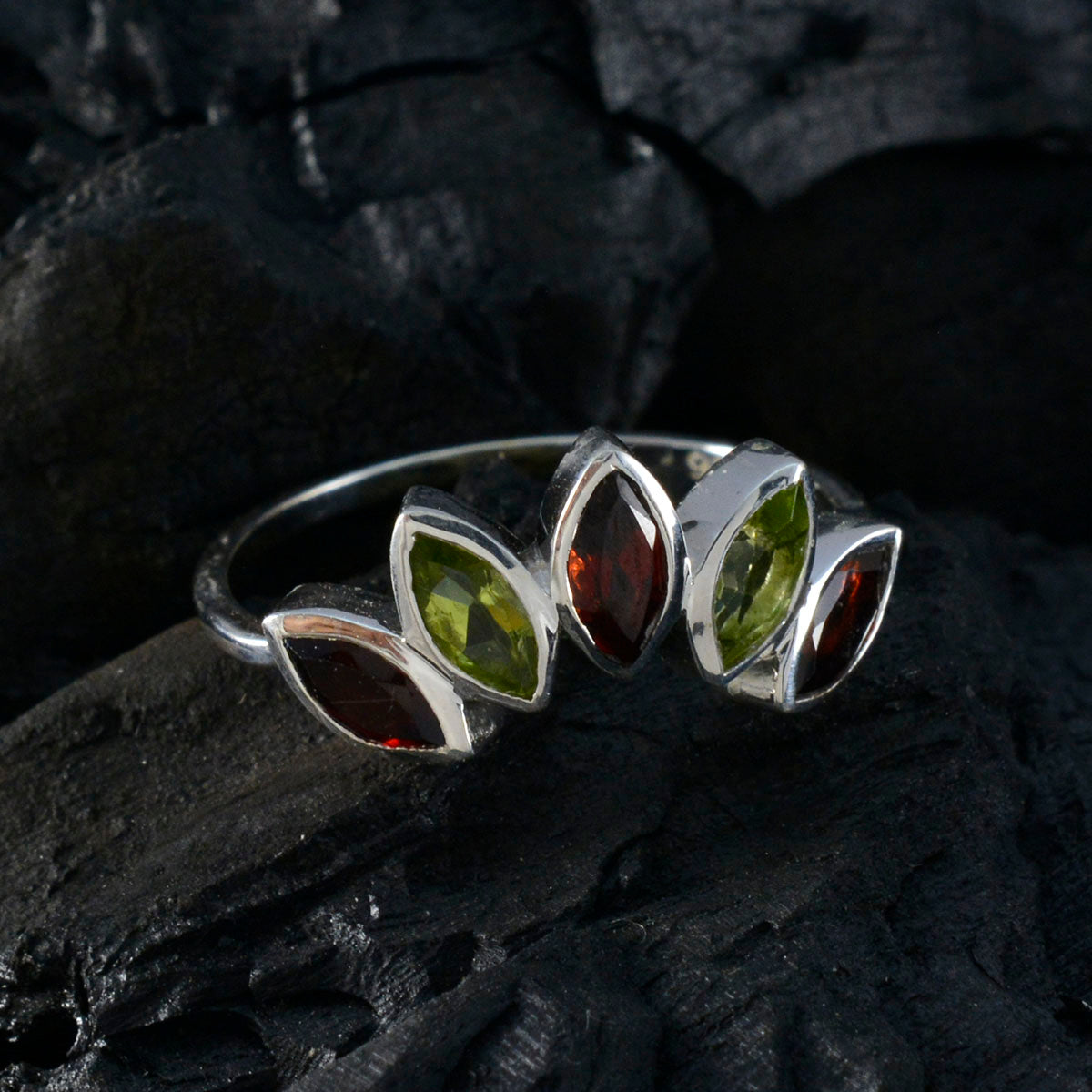 Hye jin silver ring with five marquise green and red stones arranged like a crown multicolor gemstone crown ring
