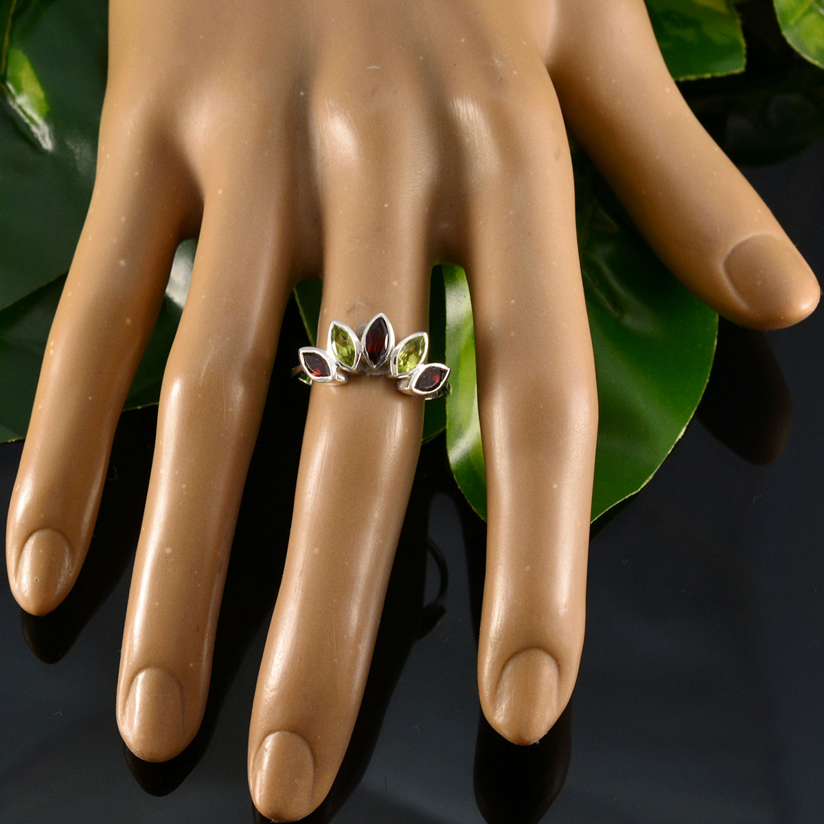 Hyejin silver multicolor gemstone crown ring with marquise stones set in crown motif on mannequin hand