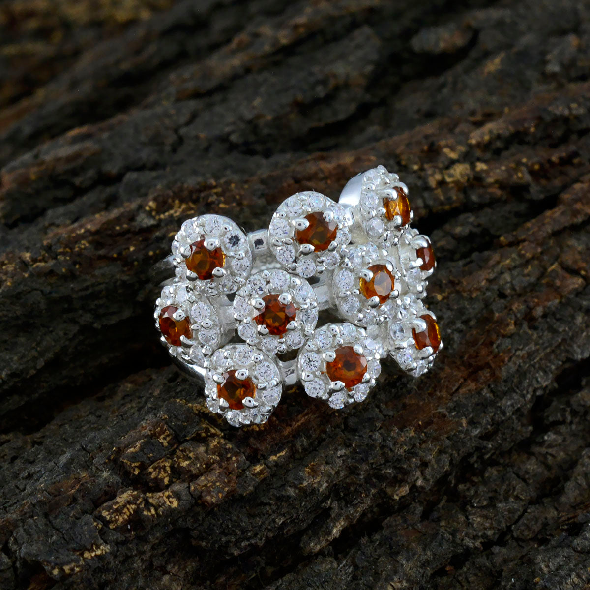 Liyana modern yellow gemstone ring cluster of amber stones with diamond halo in sterling silver