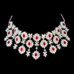 Lakshmi bridal red stone necklace featuring intricate flower designs with sparkling red stones