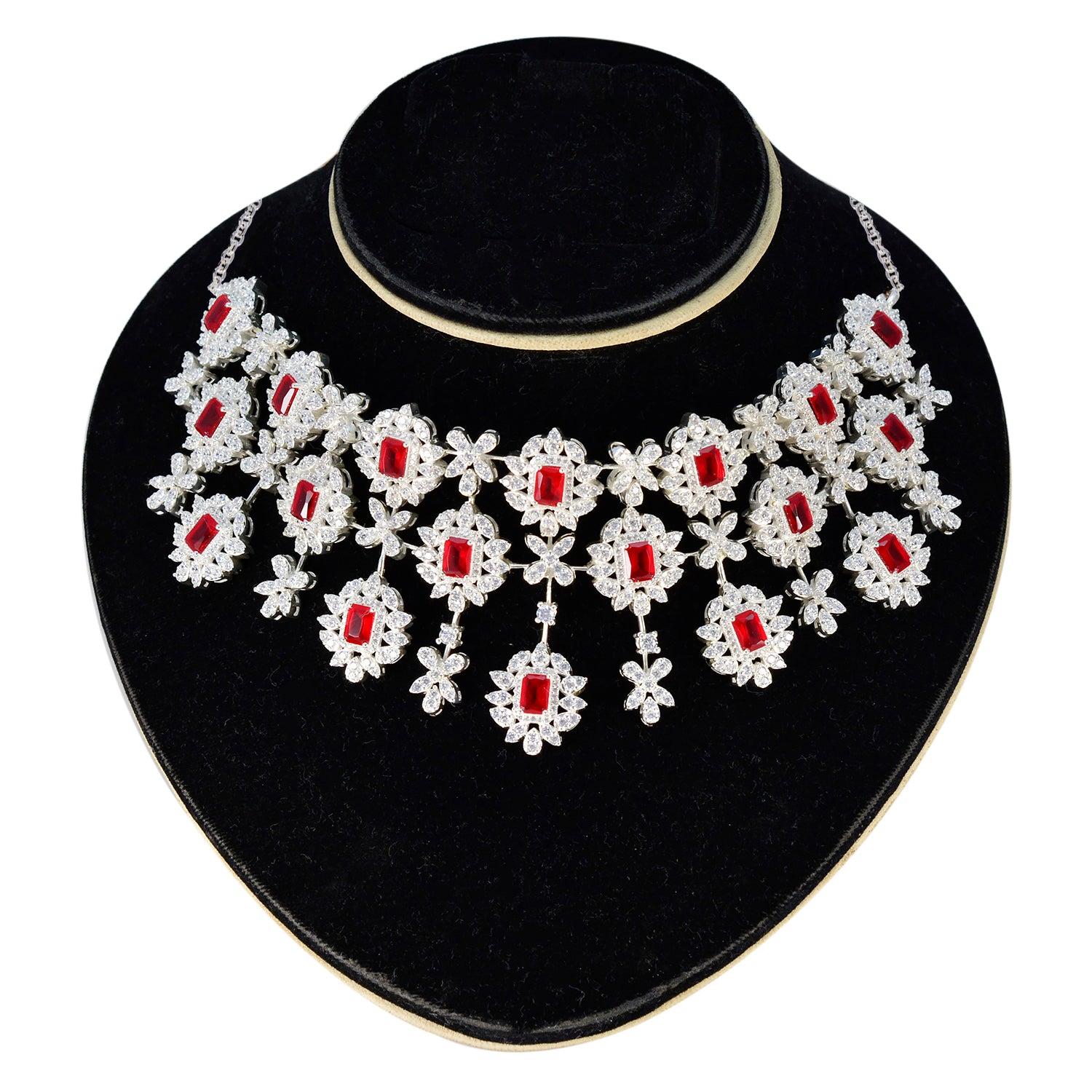 Bridal red stone necklace with intricate silver floral design for elegant wedding attire