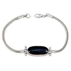 Dainty black chain bracelet with a sleek oval stone centerpiece and adjustable clasp