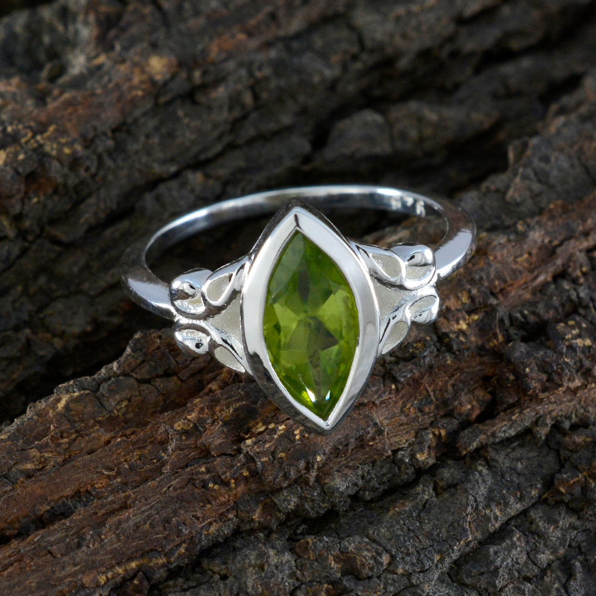 Zoey green solitaire ring featuring a marquise-cut green gemstone set in elegant silver design