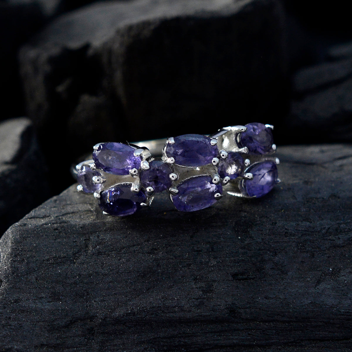 Siti sterling silver ring with six oval blue stones in a clustered design for everyday wear blue gemstone hexa ring
